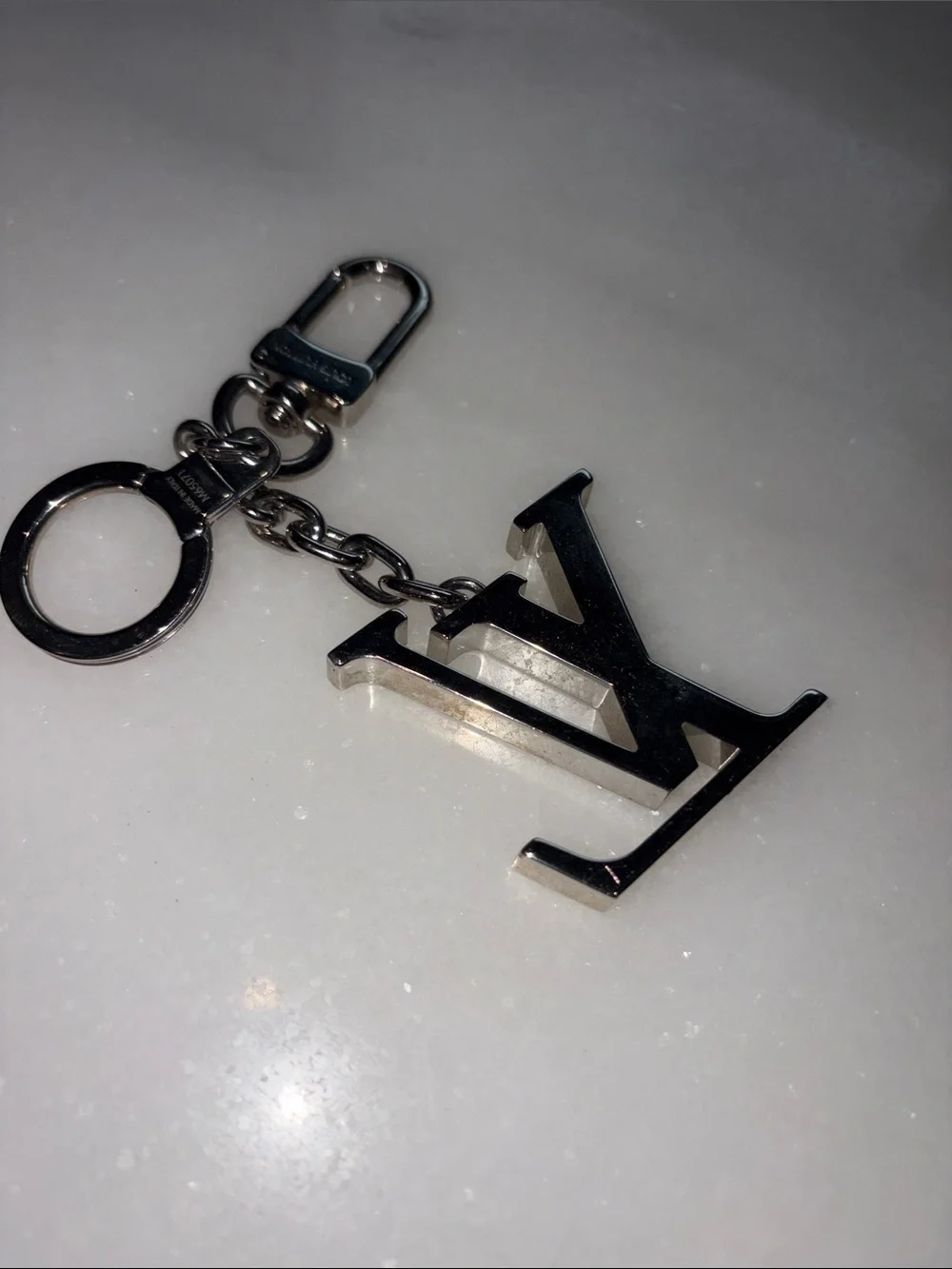 Louis Vuitton Silver LV Logo Keyring